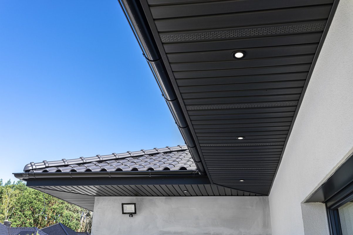 modern graphite herringbone roof lining is attached trusses visible turned led lights1